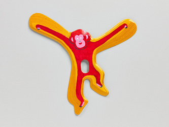 Red Monkey returning boomerang